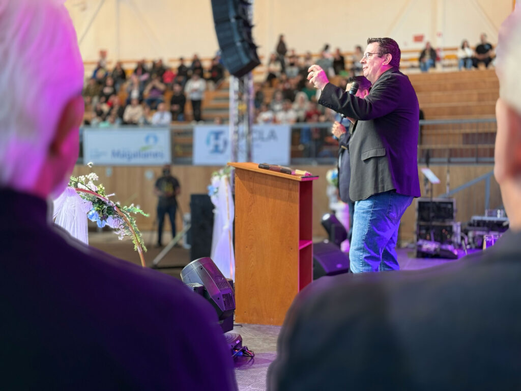 Stephen Evans preaching from a podium